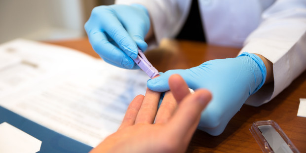 A person having a fingerprick test.