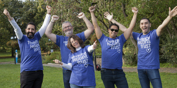 Group posing in THT shirts in a park Group posing in THT shirts in a park