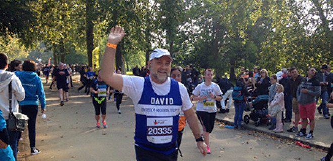 Runner David waving at the Royal Parks Foundation Half Marathon